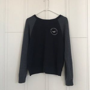 A barely worn, navy blue pullover!